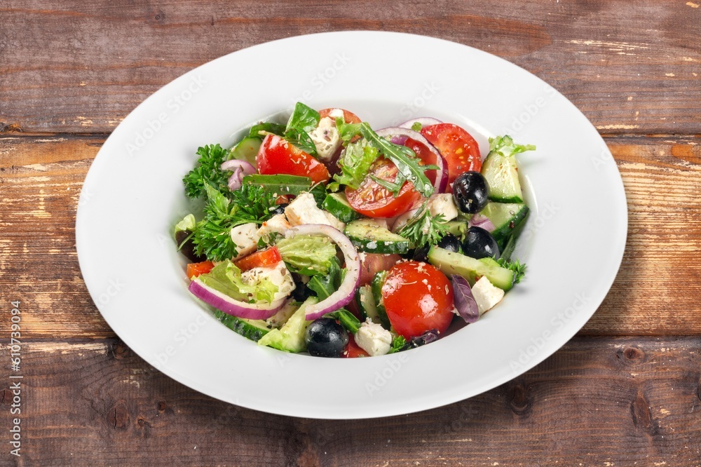 plate of fresh tasty salad with cheese plate of fresh tasty salad with cheese