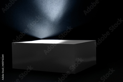 Camera flash in box on dark...