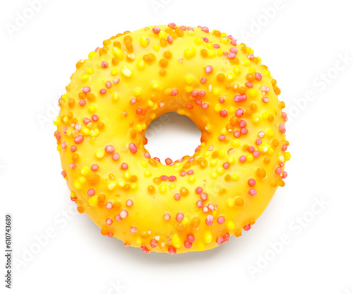 Bright yellow donut with co...