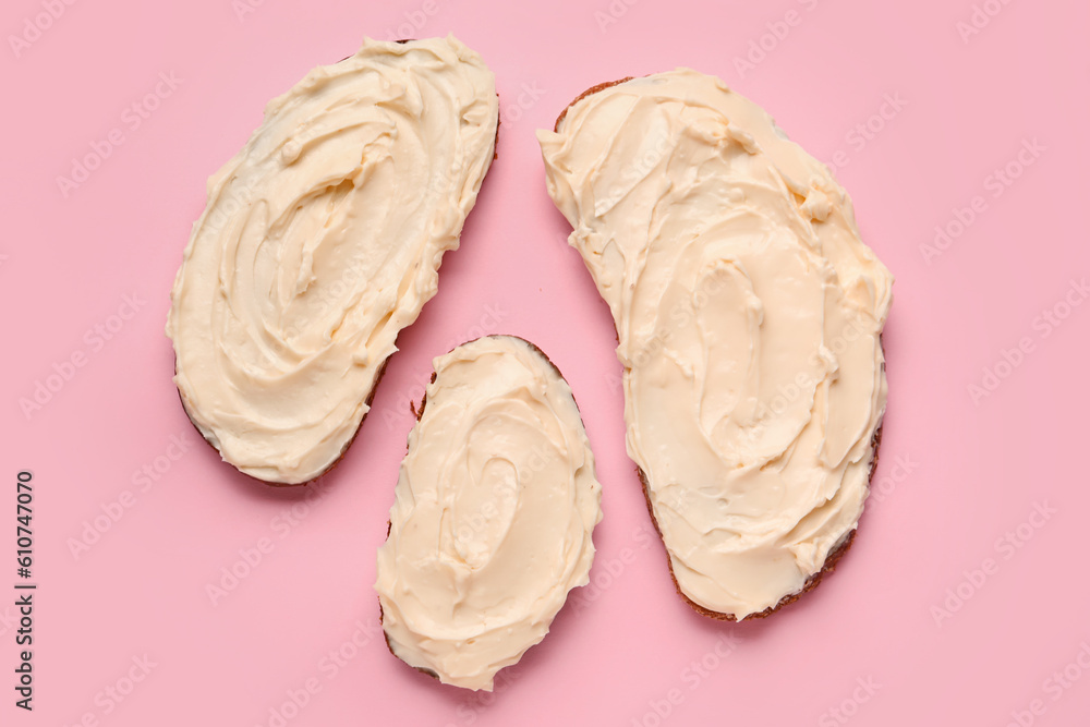 Tasty sandwiches with cream cheese on pink background Tasty sandwiches with cream cheese on pink background