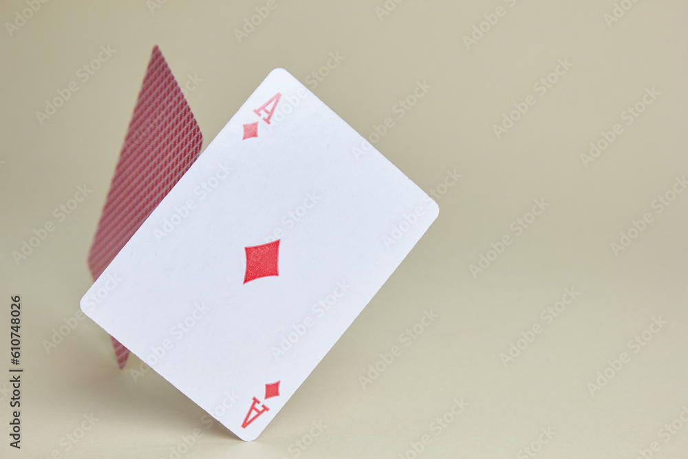 Two Balancing Ace of Diamonds Cards