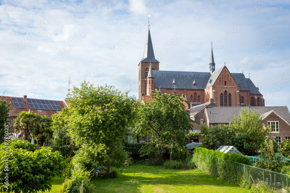 Neer, Limburg, The Netherlands -  The Sint-Martinus church is an oriented three-aisled brick cross basilica.