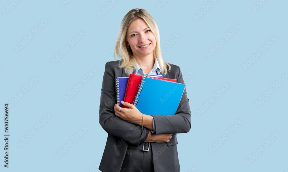 Portrait of a young happy smart woman with books Portrait of a young happy smart woman with books