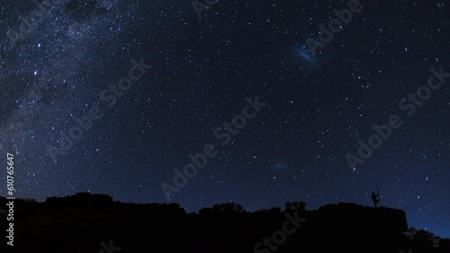 nightscape, night full of stars, view at the statue of an Australian at Mount Magnet, at night with the milkyway and the two magellanic clouds in the background