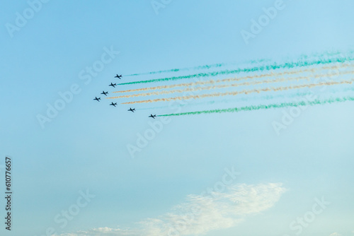 Photography Fighter jets squadron with traces in Saudi Arabian national flag colors, at Jedd