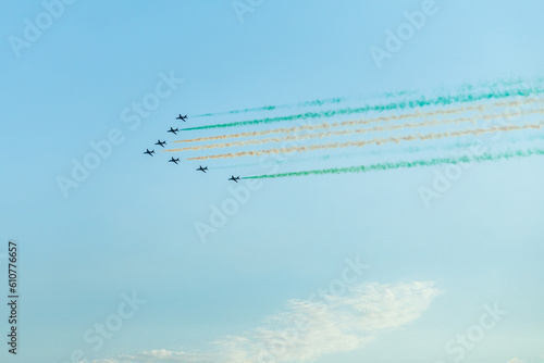 Fighter jets squadron with traces in Saudi Arabian national flag colors, at Jeddah air show photo