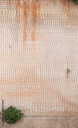 texture of the rock at the sandstone mining site with rhythmic repeating circular saw marks photo