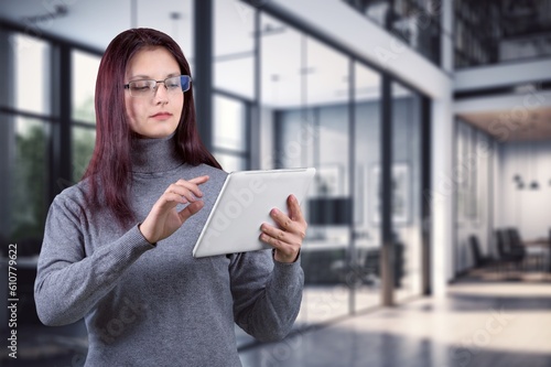 Business woman hold tablet computer in office,