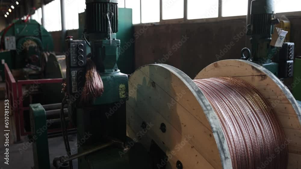 Copper processing, Wire winding, Wire manufacturing. Great number of sizable copper coils can be found in copper wire production plant. Copper processing, Wire winding, Wire manufacturing. Great number of sizable copper coils can be found in copper wire production plant.
