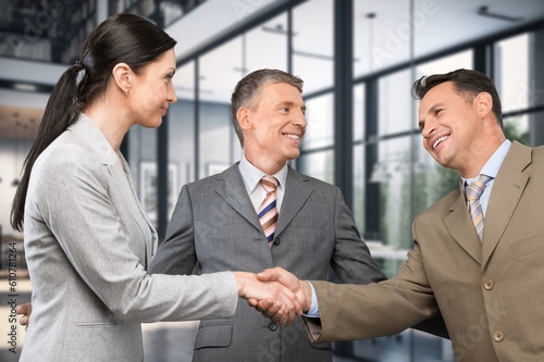 Happy business people handshake at meeting in office