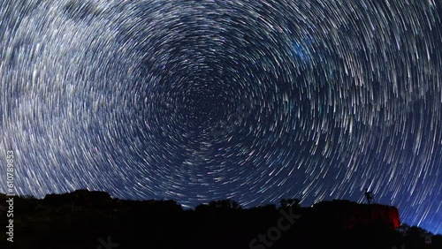 star trails in the night sky behind the statue of an Australian at Mount Magnet, nightscape, night full of stars