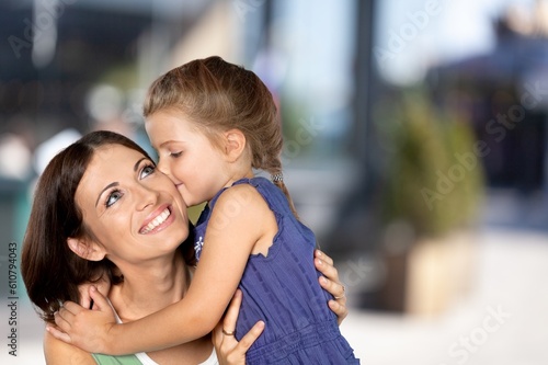 Happy young mother and cute child