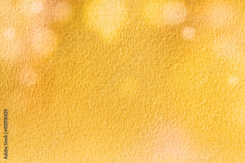 Image of yellow bokeh abstract fabric texture backgrounds. Vintage Abstract glitter lights. Copy space for holiday season, greeting card, popular festival, autumn leaves and beverage of beer..
