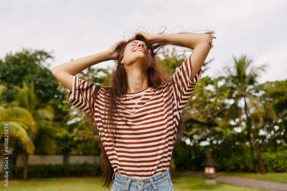 nature woman lifestyle grass beautiful park t-shirt freedom smiling summer walk nature woman lifestyle grass beautiful park t-shirt freedom smiling summer walk