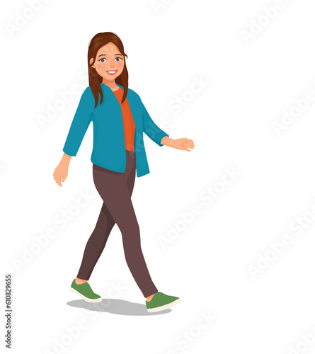 Beautiful young woman walking forward with smiling expression