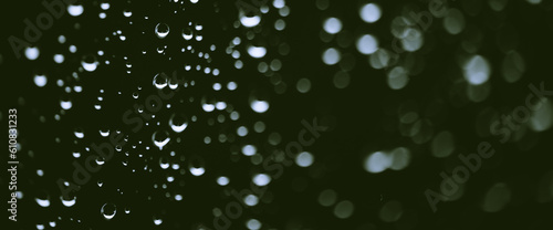 Wallpaper Mural Atmospheric minimal monochrome backdrop with rain droplets on glass. Wet window with rainy drops and dirt spots closeup. Blurry minimalist background of dirty window glass with raindrops close up. Torontodigital.ca
