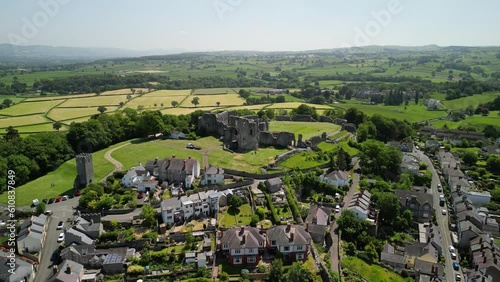 Denbigh Castle and Town Walls, Denbighshire, Wales - Aerial drone anti-clockwise distant pan from front to side - June 23 photo