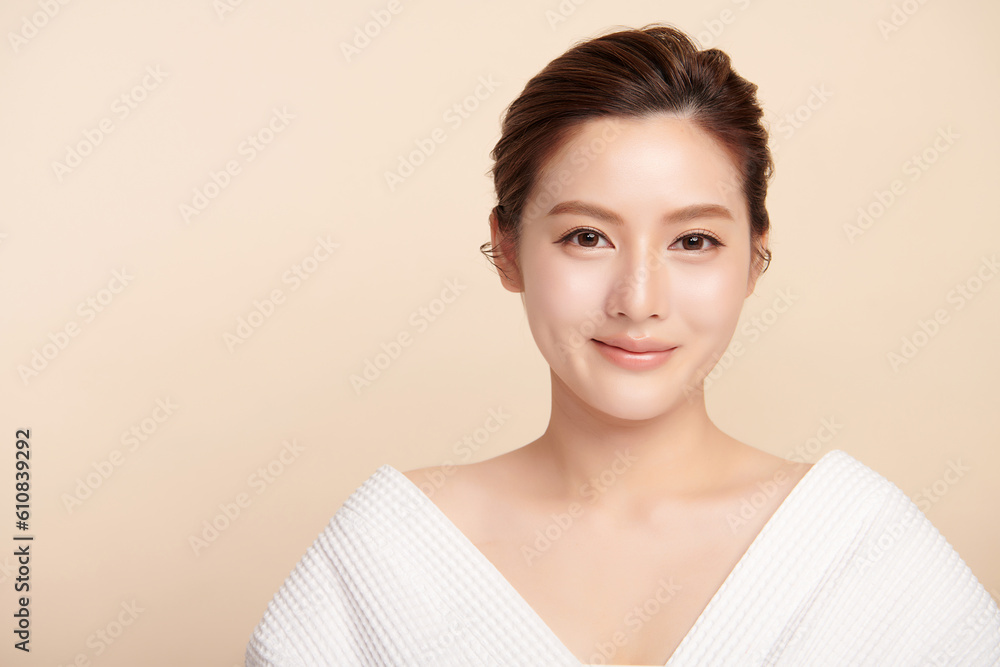 Beautiful young asian woman with clean fresh skin on beige background, Face care, Facial treatment, Cosmetology, beauty and spa, Asian women portrait. Beautiful young asian woman with clean fresh skin on beige background, Face care, Facial treatment, Cosmetology, beauty and spa, Asian women portrait.
