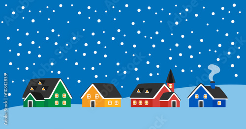 Colorful houses and snowy night landscape