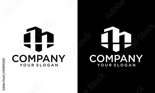 creative negative space of letter MM initial logo design, clean and strong design photo