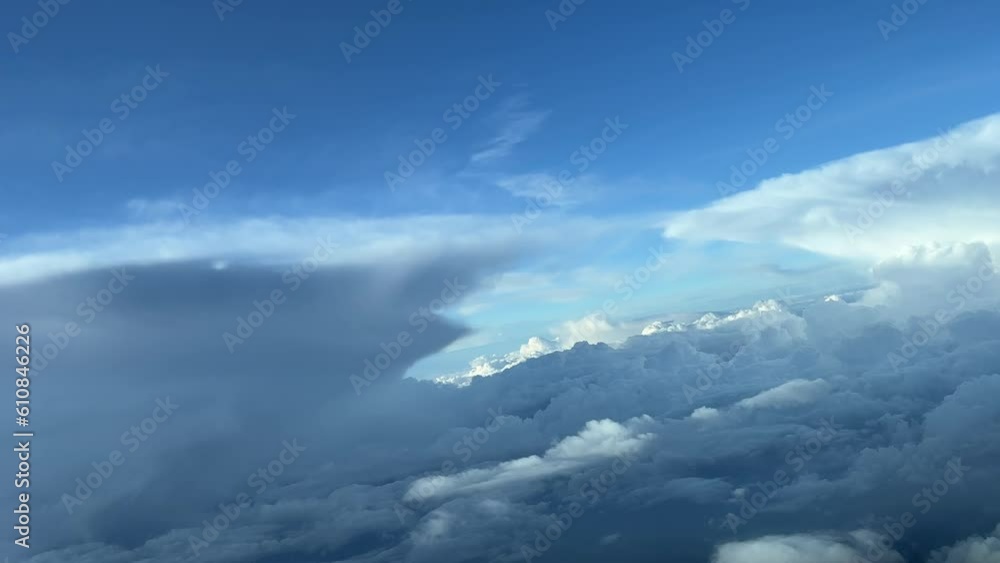 Flying between storm clouds. A unique pilot’s point of view. 12000m high. Right turn to avoid bad weather ahead. Flying between storm clouds. A unique pilot’s point of view. 12000m high. Right turn to avoid bad weather ahead.