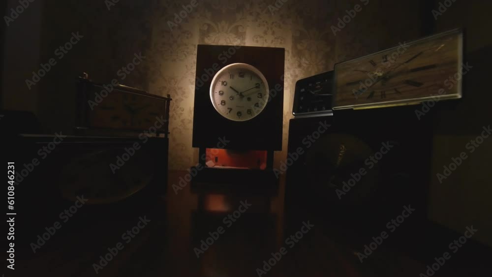 Hyperlapse Shot Of Vintage Clocks Ticking in the Dark. Video Dolly