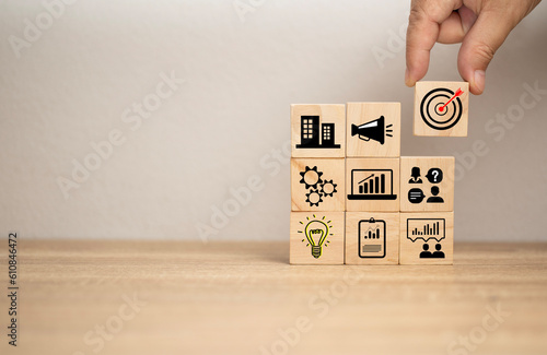 business idea concept. Light bulb, red arrow and many icon on wooden board. Icon Business success and new strategy. Industry. Medicine, engineer. Financial.