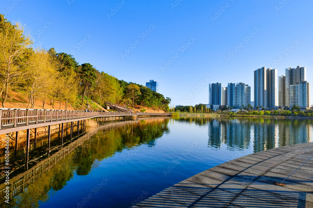view of downtown city skyline with lake.Gwanggyo lake park suwon Korea.09.04.2023 view of downtown city skyline with lake.Gwanggyo lake park suwon Korea.09.04.2023