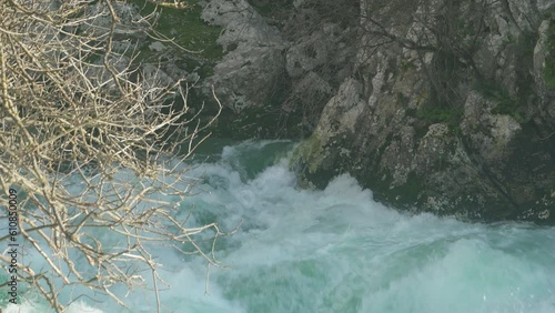 a fast-moving stream of the mountain river photo