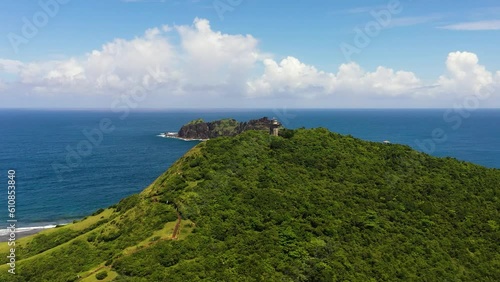 Aerial view of lighthouse on the cape. Cape Engano. Palaui Island. Santa Ana Philippines. photo