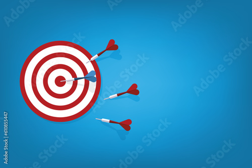 Red darts missed hitting target and only blue one hits the center. Business challenge failure and success concept.