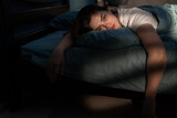 Tired woman lying in bed no sleep late at night, suffering insomnia. Girl sick or sad depressed sleeping at home.
