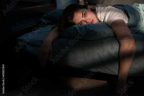 Φωτογραφία Tired woman lying in bed no sleep late at night, suffering insomnia