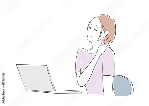 ノートパソコンでの作業で肩が凝って辛い女性
