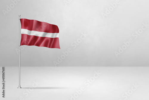 Fotografie Latvian flag isolated on white concrete wall background