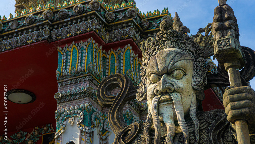 Epic warrior statue with moustache in Wat Pho Temple in Bangkok, Thailand.