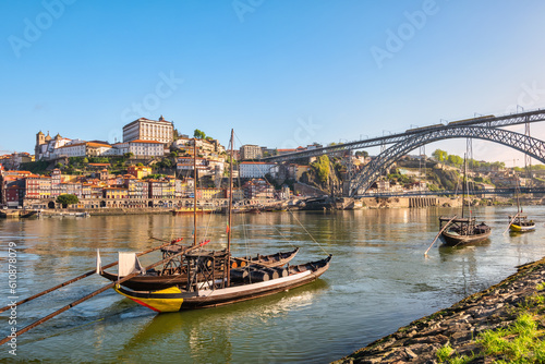 Porto Portugal, city skyline at Porto Ribeira and Douro River with Rabelo wine boat photo