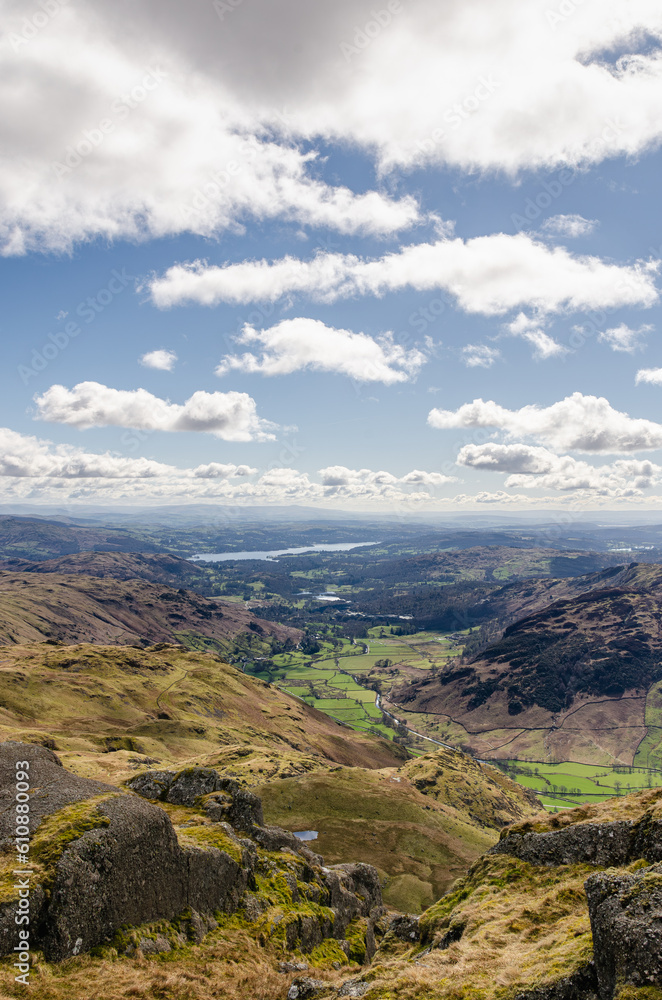 View into the valley from top of a mountain in Lake District. Grasmere can be seen in distance. England, UK. 