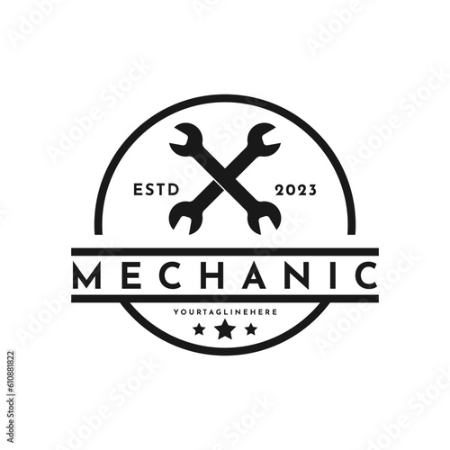 Vintage retro cross wrench logo design idea