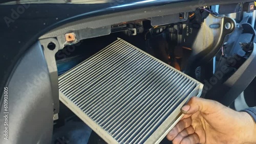 Car service - replacement of the old cabin filter with a new one. Regular car service
