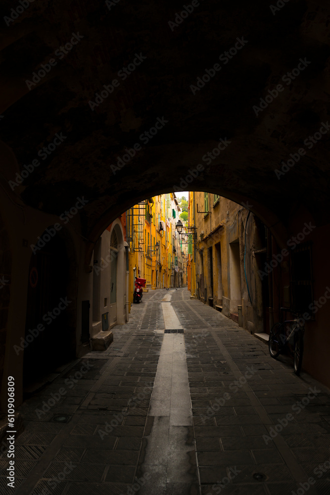 Narrow Street and Tunnel in Old Town in Menton, Provence-Alpes-Côte d´Azur, France. Narrow Street and Tunnel in Old Town in Menton, Provence-Alpes-Côte d´Azur, France.