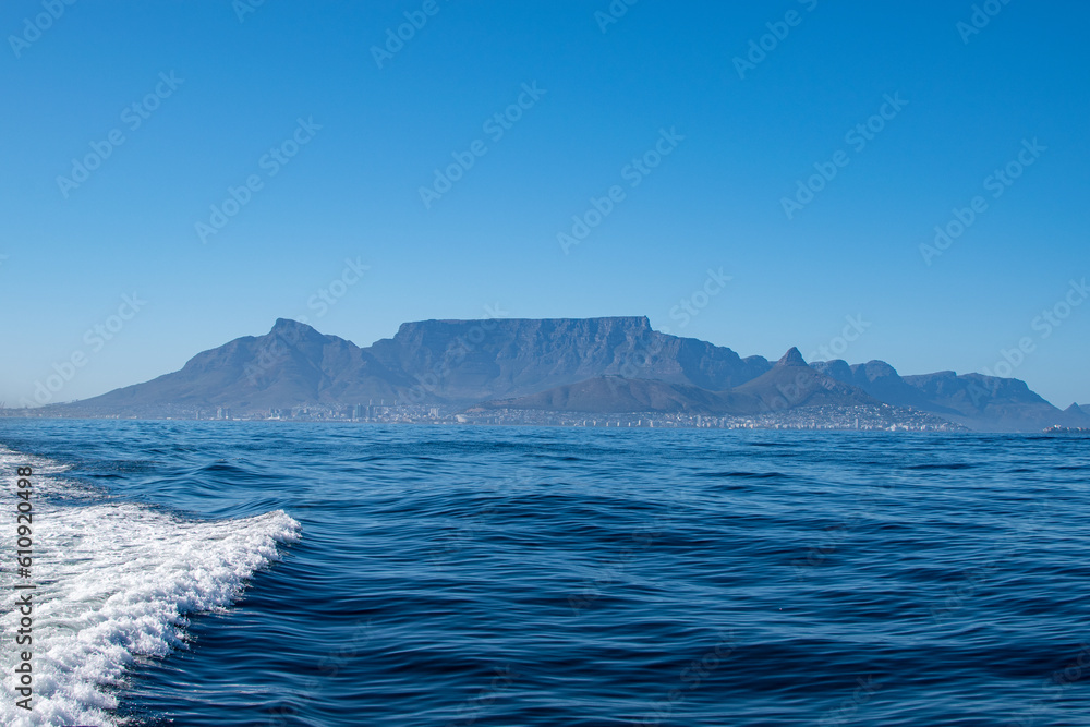 scenic view of cape town with ocean and waves in foreground