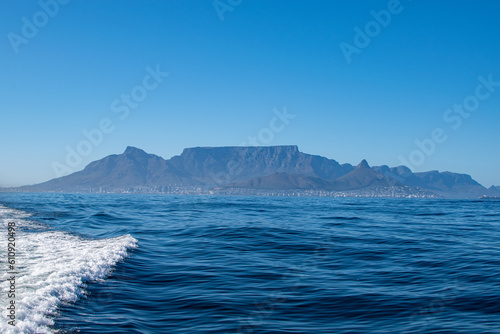 scenic view of cape town with ocean and waves in foreground © Frank