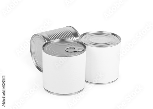 Three different canned food cans isolated on white.
