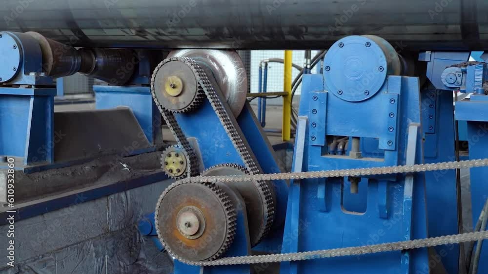 Pipe manufacturing plant. Pipe plant. Iron pipe welding. Pipe expansion. Sparks of welding. Tap. Factory. Machine tools. Production. Heavy industry. Pipe manufacturing plant. Pipe plant. Iron pipe welding. Pipe expansion. Sparks of welding. Tap. Factory. Machine tools. Production. Heavy industry.