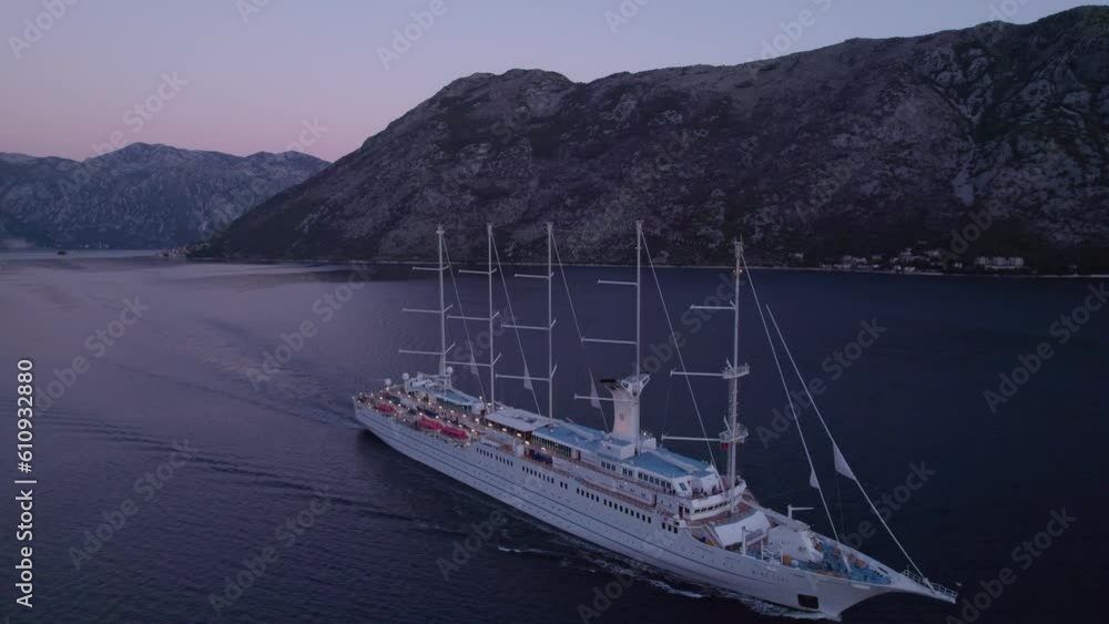 Cruise ship going through Kotor strait during blue hour Cruise ship going through Kotor strait during blue hour