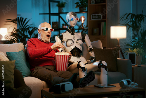 Man and AI robot watching movies together