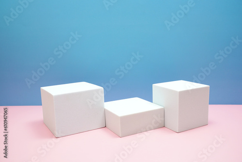 Podium display scene stage showcase front view with copy space on pink and blue background