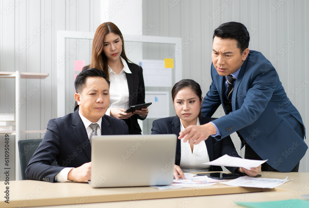 Business mentor meeting with team in office looking at computer screen training management concept. Asian businessman work together with executive colleague group talking mentoring leadership idea. Business mentor meeting with team in office looking at computer screen training management concept. Asian businessman work together with executive colleague group talking mentoring leadership idea.
