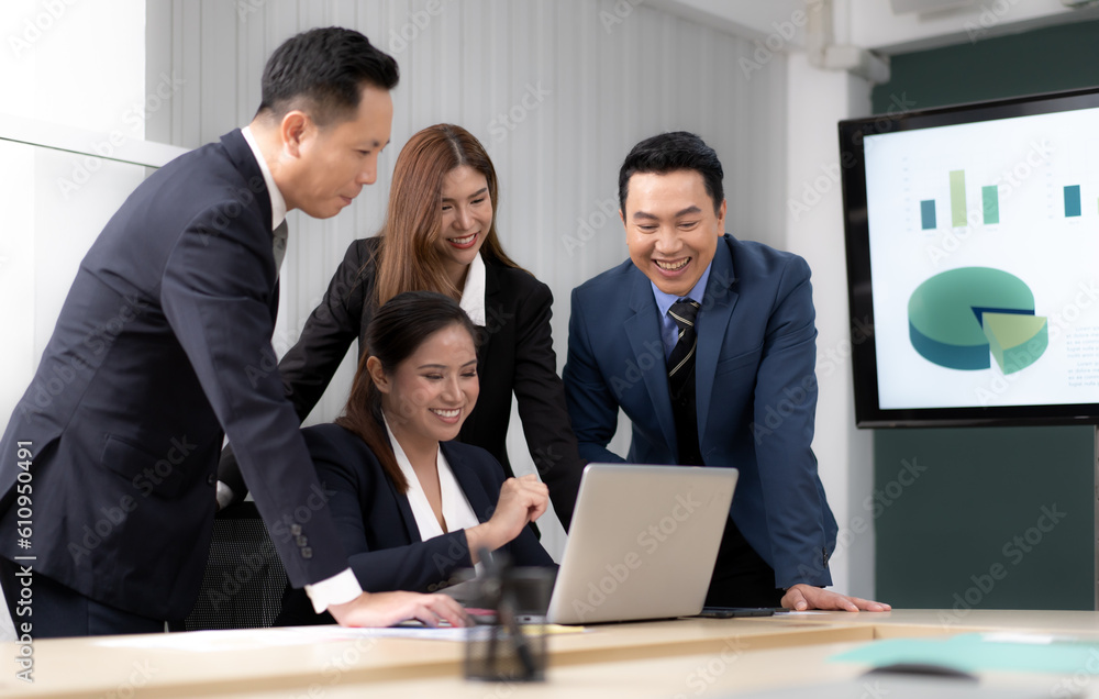 Business mentor meeting with team in office looking at computer screen training management concept. Asian businessman work together with executive colleague group talking mentoring leadership idea. Business mentor meeting with team in office looking at computer screen training management concept. Asian businessman work together with executive colleague group talking mentoring leadership idea.